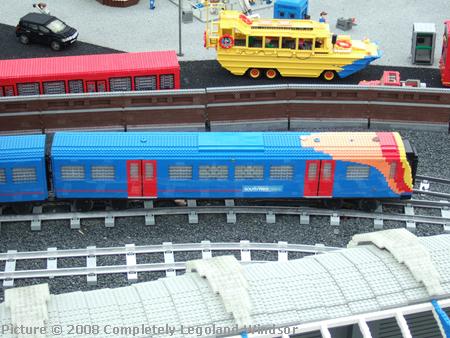 A South West Train arrives at Waterloo Station,
with a Duck Tours amphibious landing craft in the background, and TARDIS, Doctor and K9 behind that!